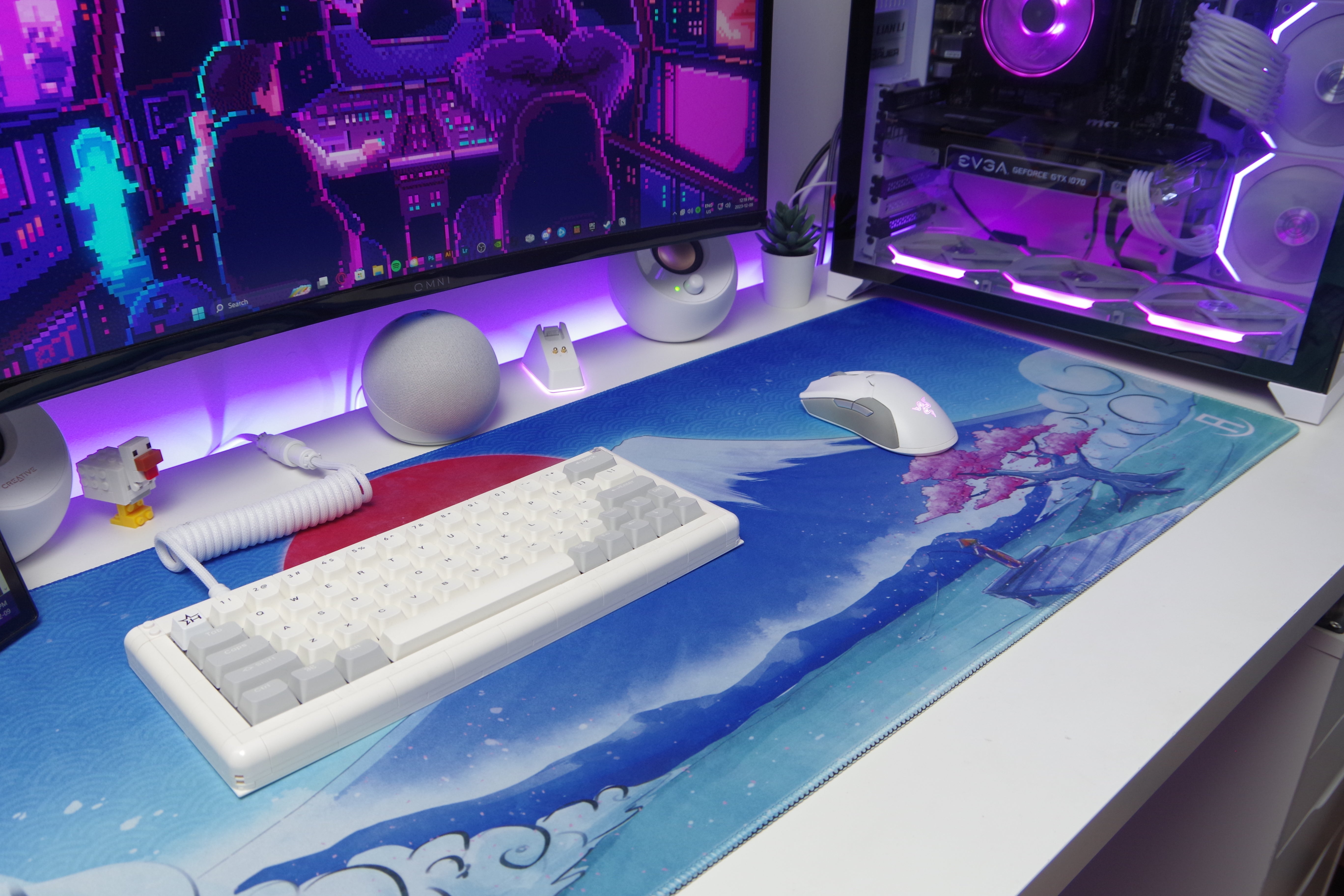 fuji fishing deskpad/mousepad in gaming setup that is all white and the mousepad is waterproof