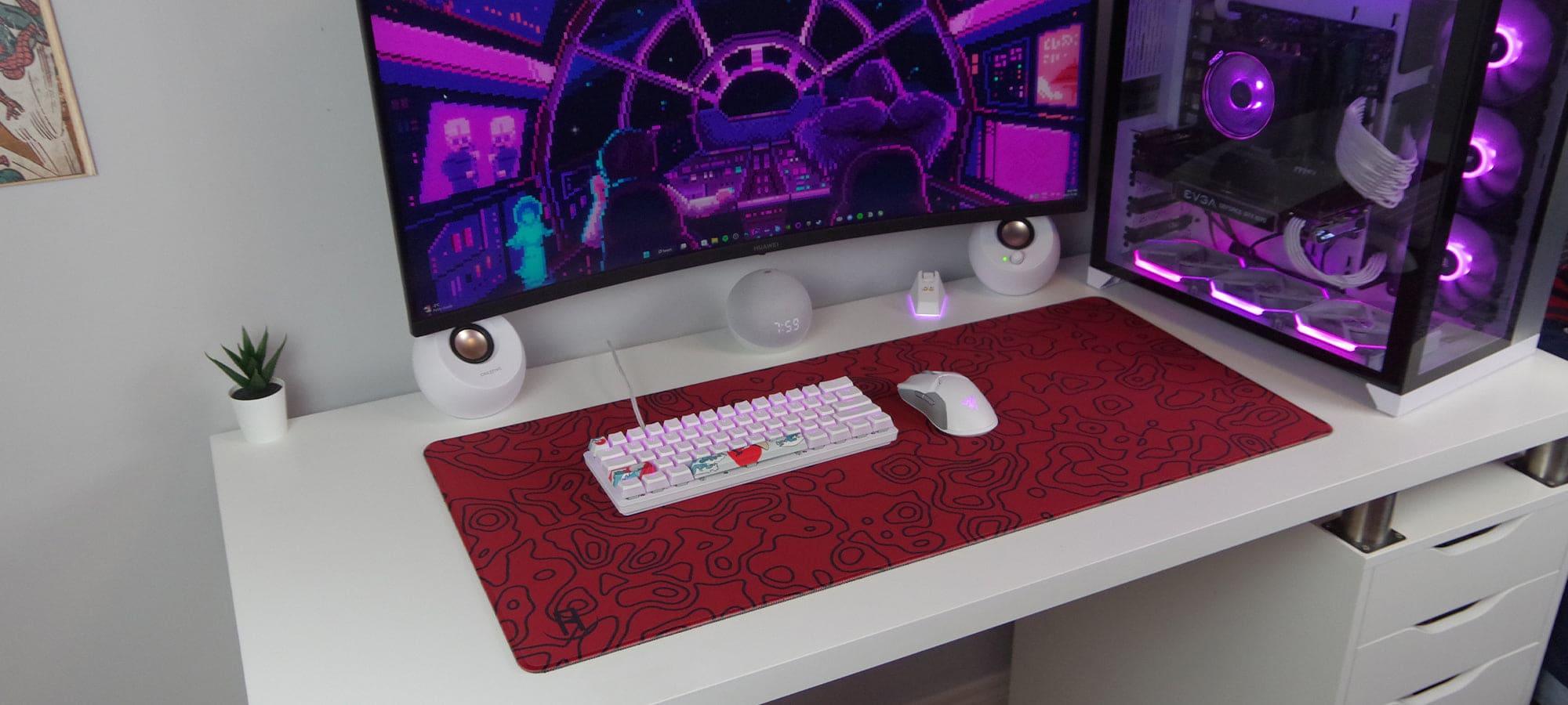 Red topography deskpad and mousepad on desk 45 degree angleview