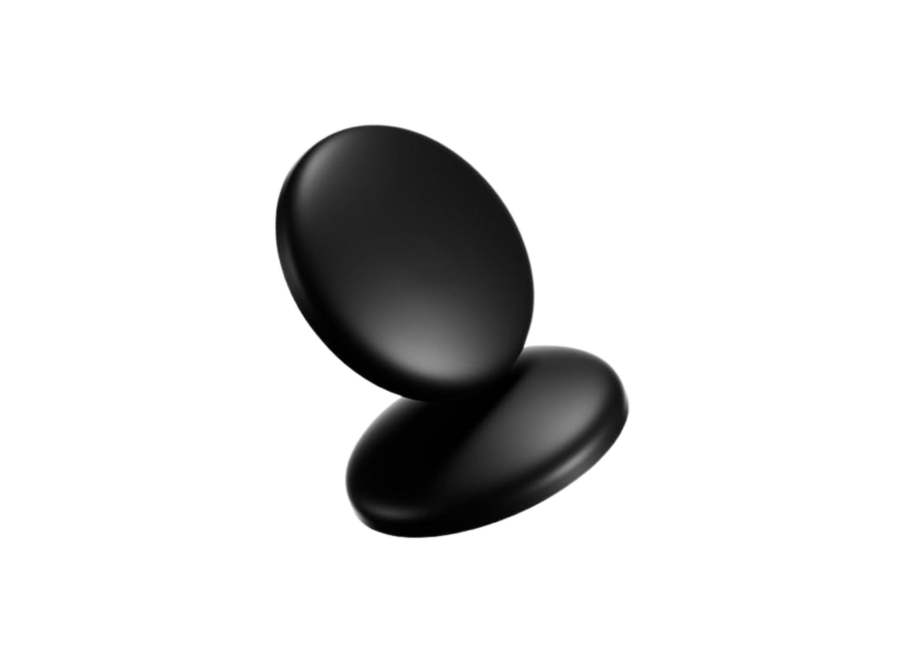 black UHMW-PE mouse skates floating on a white background