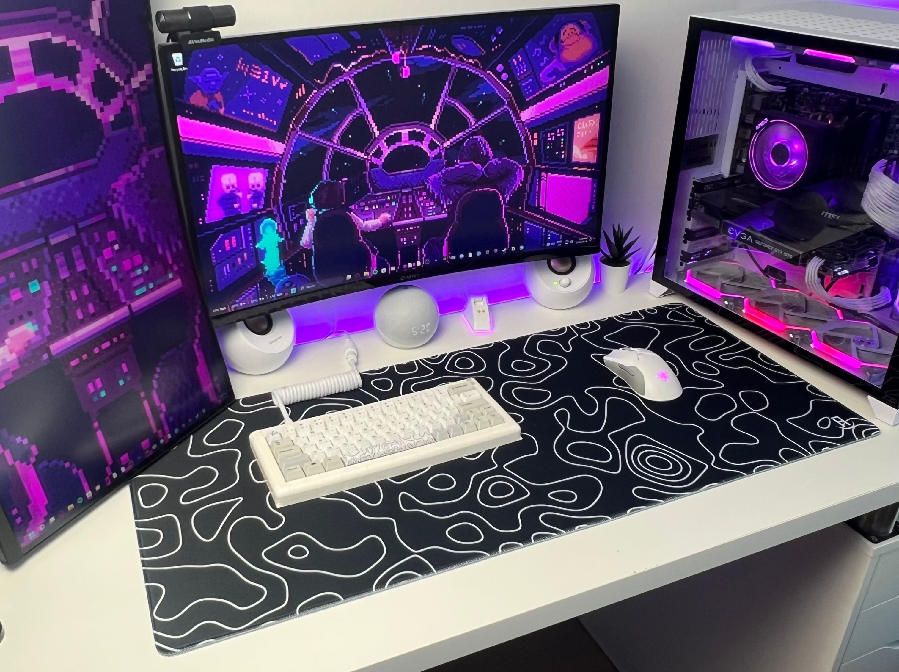 black topography gaming desk pad in gaming setup